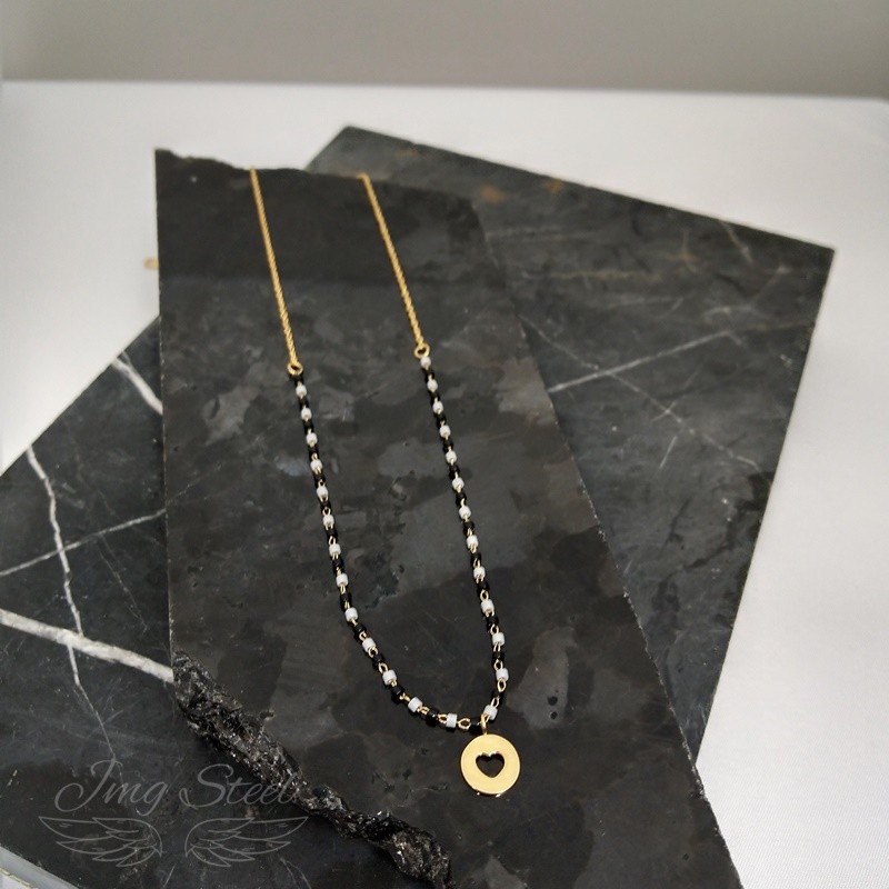 Naszyjnik z koralikami i serduszkiem